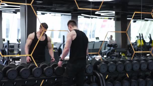 Muscular Man Doing Exercises Dumbbells Man Doing Lift Ups Holding — Stock Video