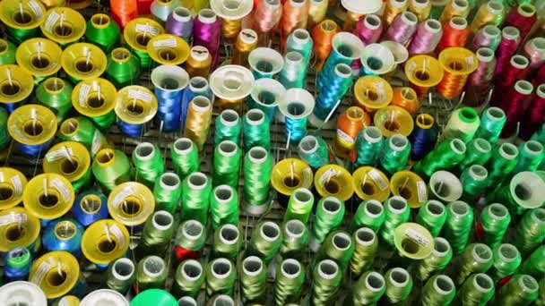 Background Colorful Spools Rows Spools Thread Different Colors Sewing Machine — Stock Video