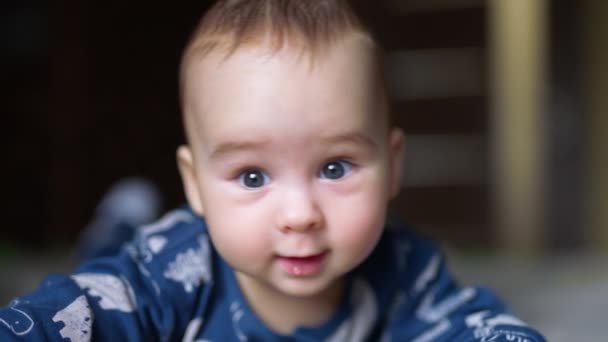 Face Adorable Toddler Boy Looking Curiously Camera Little Baby Smiling — Stock Video