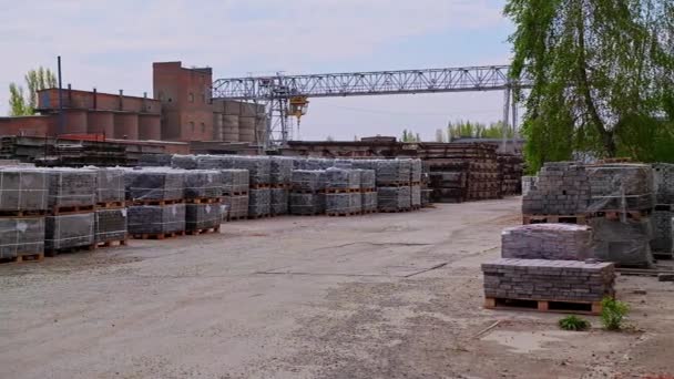 Industrial Area Building Materials Stacked Piles Grey Bricks Wooden Pallets — Stock Video