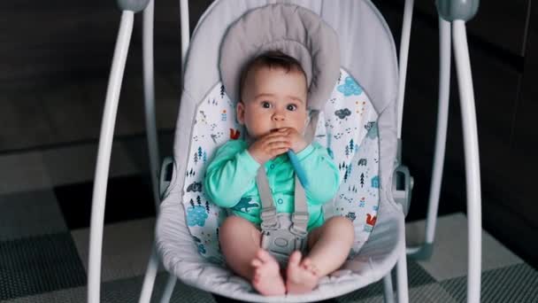 Lovely Peaceful Child Sitting Rocking Baby Chair Toddler Dirty Face — Stock Video