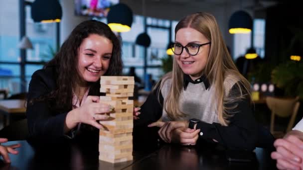Colleagues Having Break Work Playing Board Games Two Ladies Pull — Stock Video