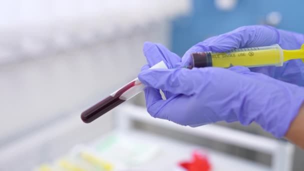 Female Nurse Hands Protective Latex Glove Fill Test Tube Blood — Stock Video