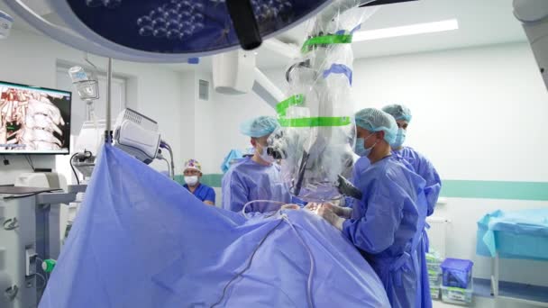 Operating Surgeons Use Powerful Advanced Microscope Operation Chief Doctor Looks — Stock Video