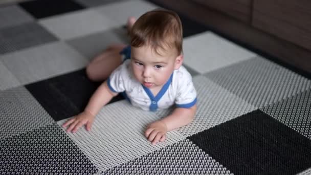 Adorable Baby Boy Lying Floor Calm Child Looking Lying Peacefully — Stock Video