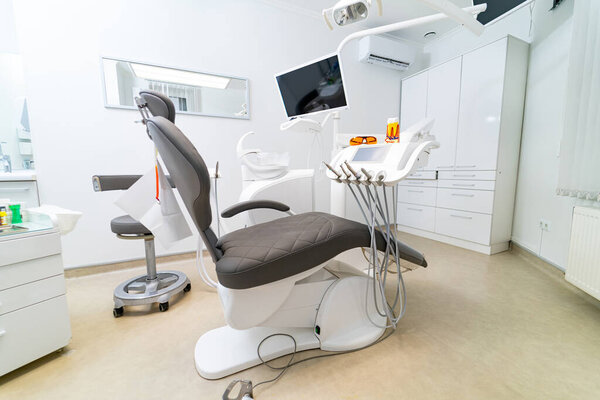 Dentistry new hospital room. Interior modern stomatology equipment.