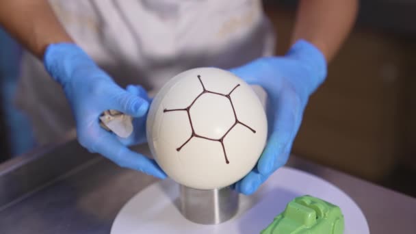 Confectioner Decorates Ball Shaped White Cake Chocolate Producing Desserts Factory — Stock Video