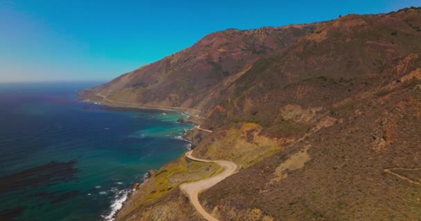 Sloping Mountains Ocean Waters Foot Dangerous Highway Rocks Coastline Aerial — Stock Video