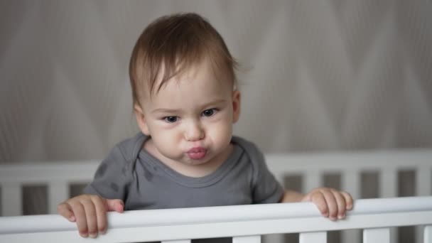 Sweet Little Baby Boy Making Faces Standing His Crib Lovely — Stock Video