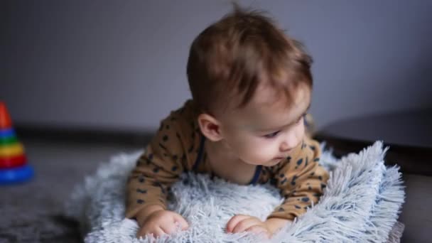 Persistent Active Caucasian Baby Boy Crawling Pillow Floor Beautiful Toddler — Stock Video