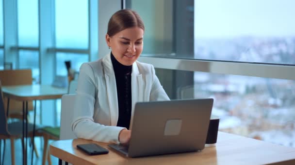 Young Woman White Jacket Sitting Front Her Laptop Smiling Lady — Stock Video