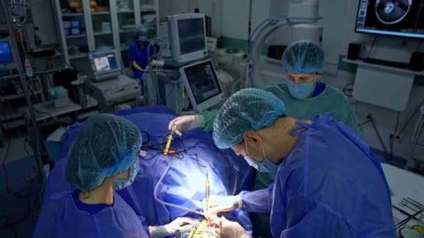 Neurosurgeon Working Modern Electric Tool Surgery Nurse Spraying Operation Area — Stock Video