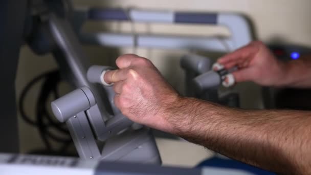 Doctor Hands Manipulating Robotic Arms Vinci Surgeon Close Professional Using — Stock Video
