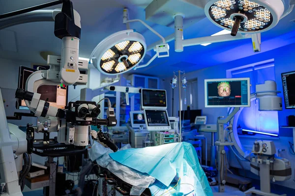 Operating modern hospital room. Blue sterile surgery technologies.