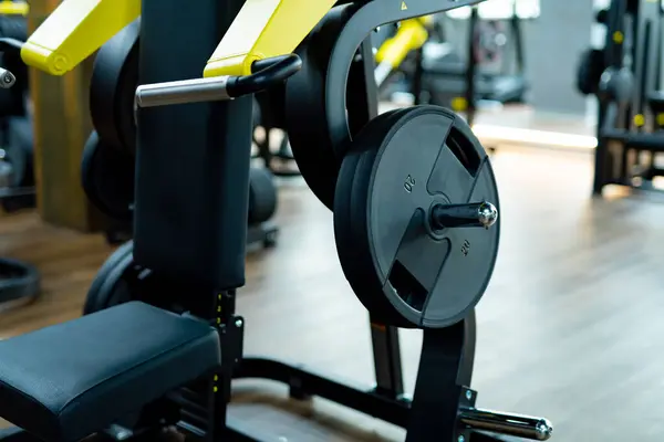 Closeup of weight training machine in gym.