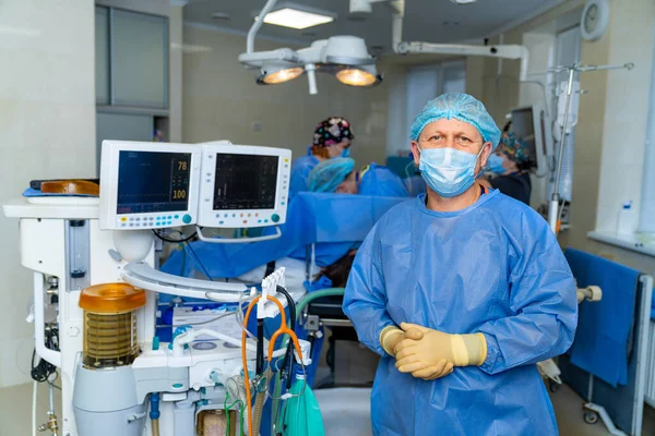Surgery modern specialist in uniform. Professional operation doctor.