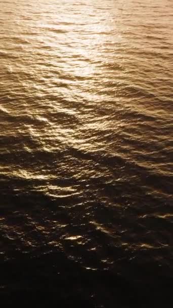 Calm Water Sea Ocean Sundown Setting Sun Reflecting Surface Hazy — Stock Video