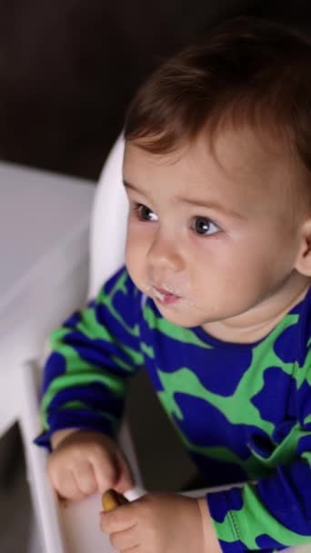 Adorable Toddler Eating Porridge Given His Mom Spoon Lovely Boy — Stock Video