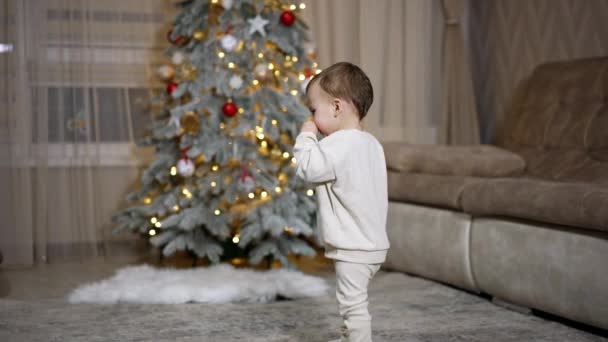 Lovely Toddler Walking Room Decorated Christmas Baby Comes Christmas Tree — Stock Video