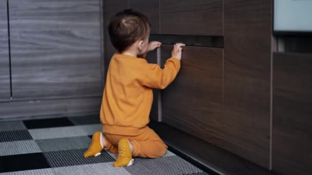 Toddler Orange Sport Suit Kneeled Closets Kitchen Baby Boy Opens — Stock Video