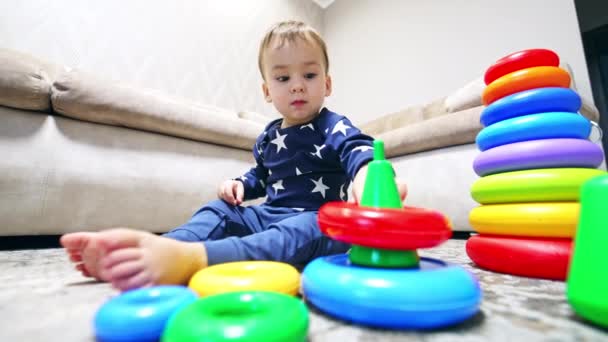 Smart Toddler Plays Pyramid Sitting Floor Calm Little Baby Having — Stock Video