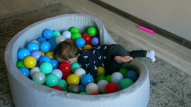 Adorable Active Toddler Jumps Dry Basin Balls Happy Funny Kid — Stock Video