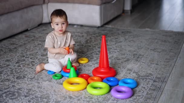 Little Barefoot Boy Sits Carpet Surrounded Toys Caucasian Toddler Learning — Stock Video