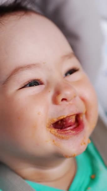 Baby Laughing Being Fed Rises Hands Cheerfully Mom Spoon Shoves — Stockvideo