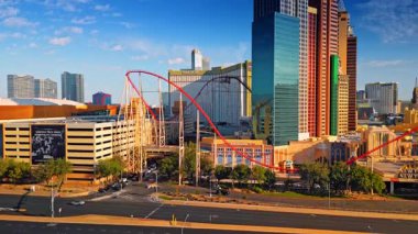 Las Vegas, USA, 11 September 2025: Roller coaster roads around high-rise colorful buildings. Rising along the New York-New York Hotel and Casino in Las Vegas, Nevada, USA.