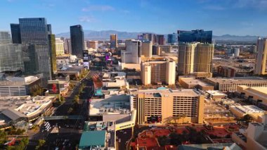 Las Vegas, USA, 11 September 2025: Lively traffic on the streets of sunny urban landscape. Aerial perspective on the cityscape of Las Vegas, Nevada, USA with numerous luxurious hotels.