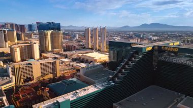 Las Vegas, USA, 11 September 2025: Modern beautiful high-rise luxurious hotels in the cityscape of Las Vegas, Nevada. USA. Drone footage over the sunny city with developed infrastructure.