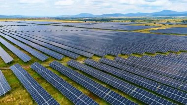 Wide solar power farm landscape. Aerial wide landscape view of a solar power farm in Romania.