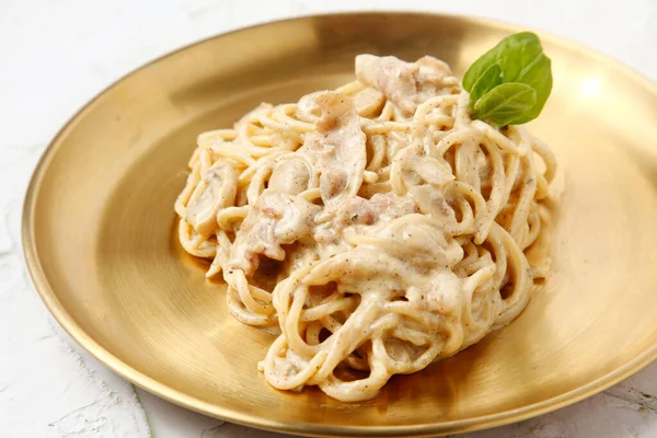 stock image Photo of freshly cooked carbonara pasta.