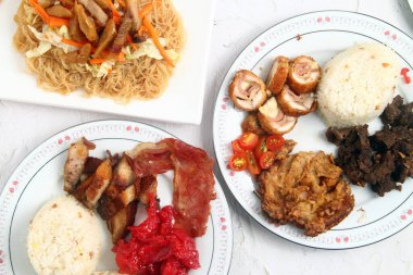 Photo of freshly cooked assorted Filipino food.