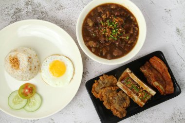 Photo of freshly cooked assorted Filipino food.