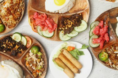 Photo of freshly cooked assorted Filipino food.