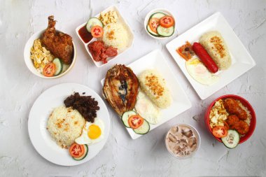 Photo of freshly cooked assorted Filipino food. clipart