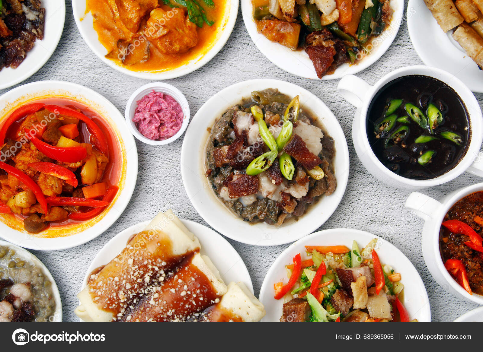 Photo Freshly Cooked Assorted Filipino Dishes Stock Photo by ©junpinzon