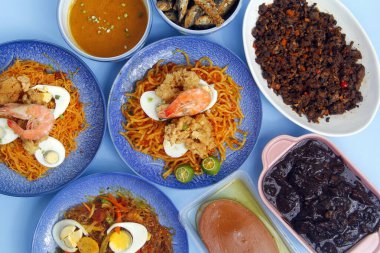 Photo of freshly cooked assorted Filipino food.