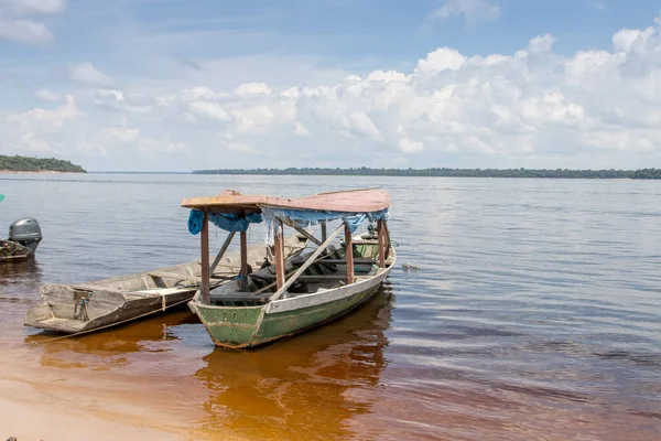 stock image Old wooden passenger boat that are common docked on the shore of the Rio Negro in Airao , Brazil