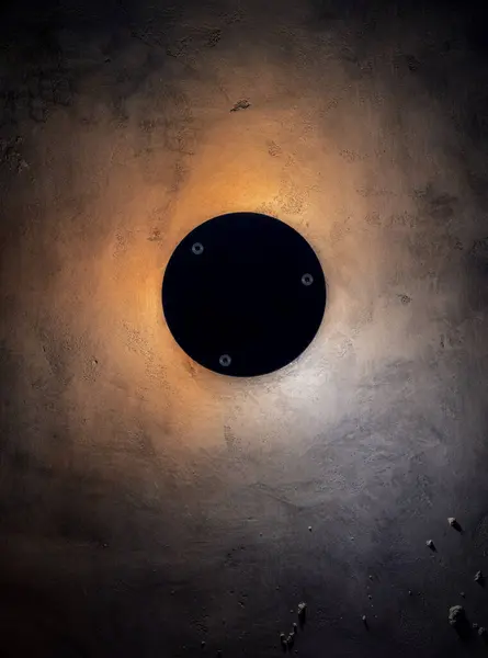 stock image Glowing Round Lamp on Grunge Gray Concrete Wall.