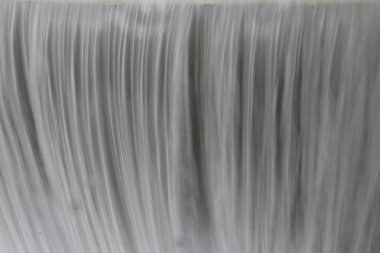 Baraj-soyut doğa arka planında çalkantılı gri su. Yüksek kalite fotoğraf