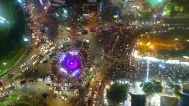 Aerial view of Da Lat city night beautiful tourism destination in central highlands Vietnam. Urban development texture, green parks and city lake.