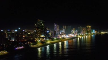 The coastal city of Nha Trang seen from above at night. This is a famous city for cultural tourism in central Vietnam