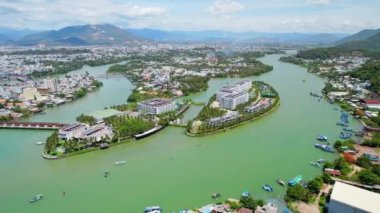 The coastal city of Nha Trang seen from above on a sunny summer afternoon. This is a famous city for cultural tourism in central Vietnam