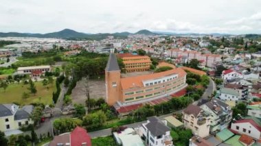 Da lat, Vietnam - July 8th, 2022: Aerial view Da Lat Pedagogical College in morning, with its unique arc-shaped French architecture, this place trains teachers to teach students in Da Lat, Vietnam