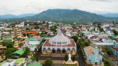 Bao Loc, Vietnam - July 8th, 2022: Aerial view Architectural outside Bao Loc Cathedral, a place for parishioners to come to confession and pray for peace for their families in Bao Loc, Vietnam