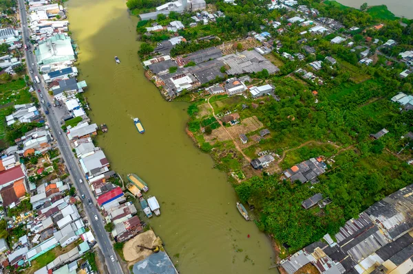 stock image Aerial view landscape of the Mekong Delta in Sa Dec, Dong Thap, Vietnam, residential development, waterway transport, and agricultural economy in Vietnam