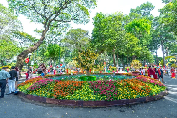 stock image Ho Chi Minh City, Vietnam - January 22rd, 2023: Festival scene in Tao Dan park serving the Lunar New Year in the spring morning attracting visitors in Ho Chi Minh City, Vietnam