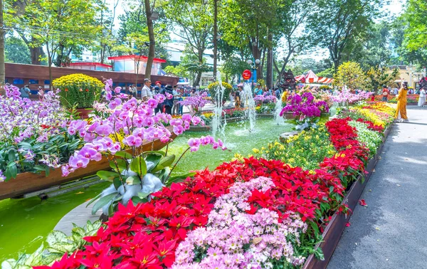 stock image Ho Chi Minh City, Vietnam - January 22rd, 2023: Festival scene in Tao Dan park serving the Lunar New Year in the spring morning attracting visitors in Ho Chi Minh City, Vietnam